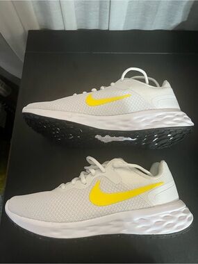 Nike revolution, yellow, and white